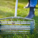 Professional landscaper providing aeration